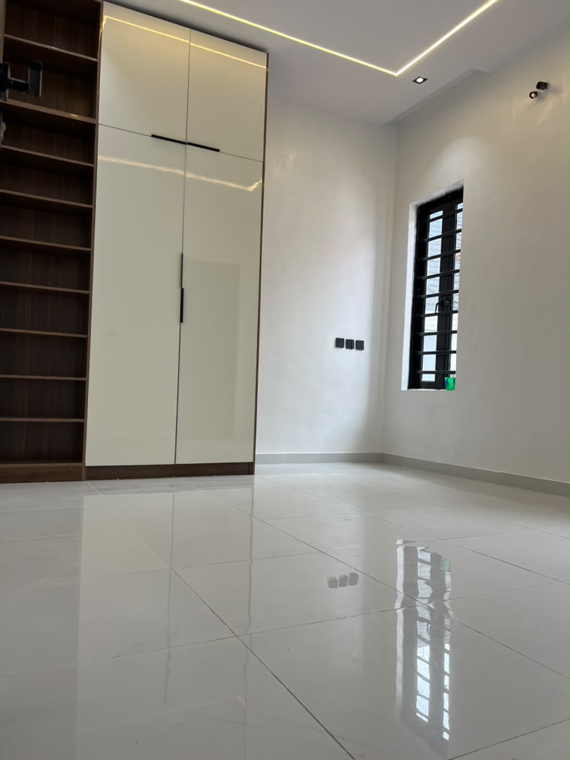 Family lounge with black marble feature wall